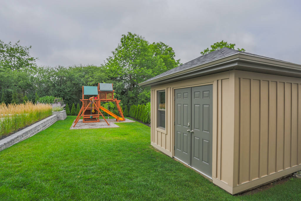 Matching sheds. London Ontario cabana matching shed design and construction project by Core Builders, a London Ontario home builder & home renovations contractor.